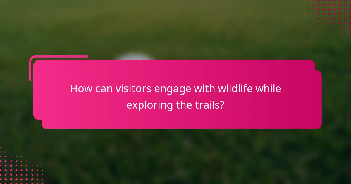 How can visitors engage with wildlife while exploring the trails?